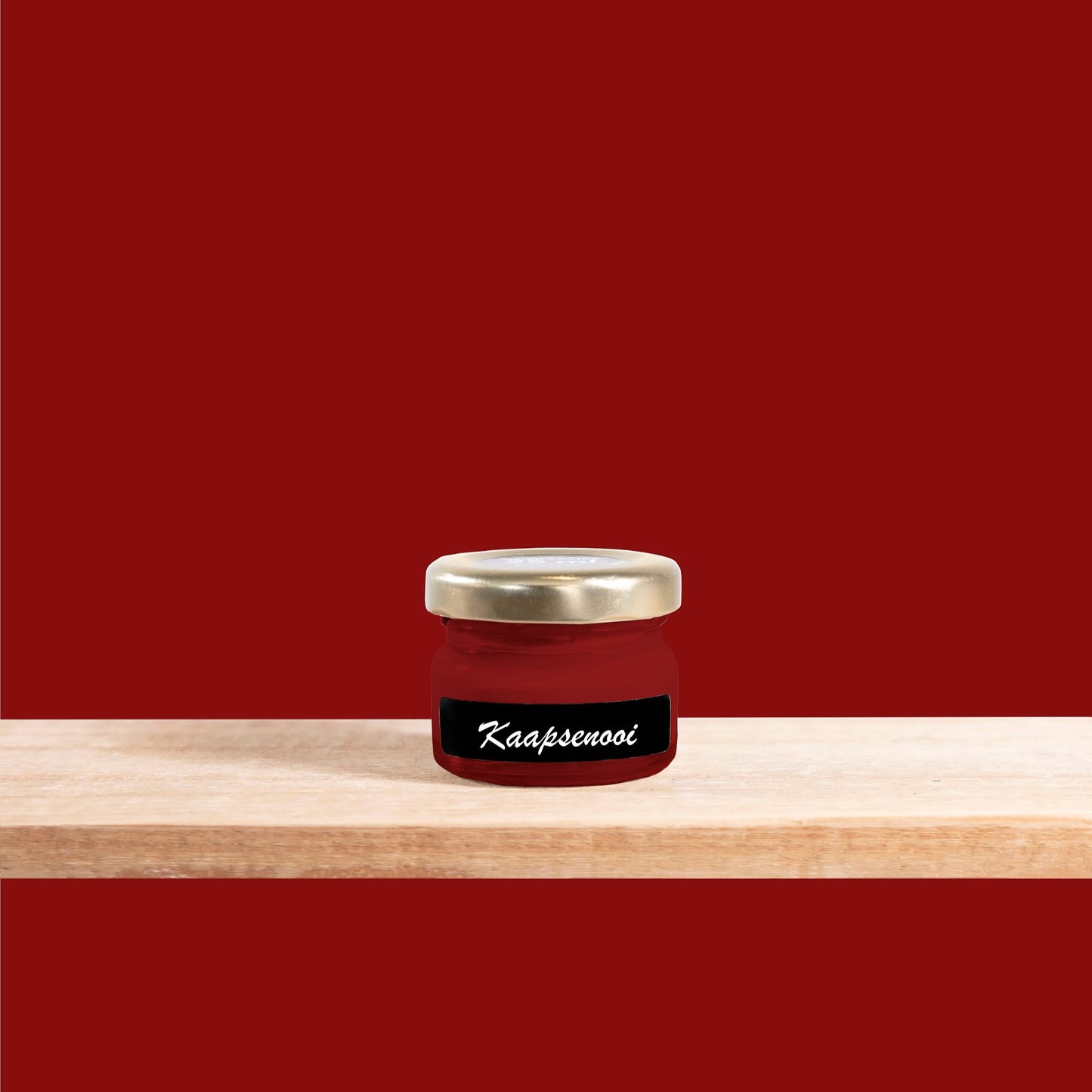 A deep red shade that radiates warmth and timeless elegance