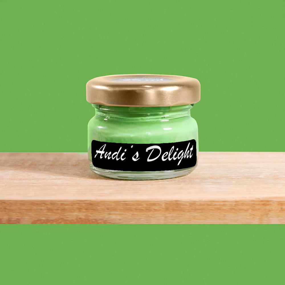 Andi's Delight is a vibrant shade of green, reminiscent of lush meadows and vibrant foliage.