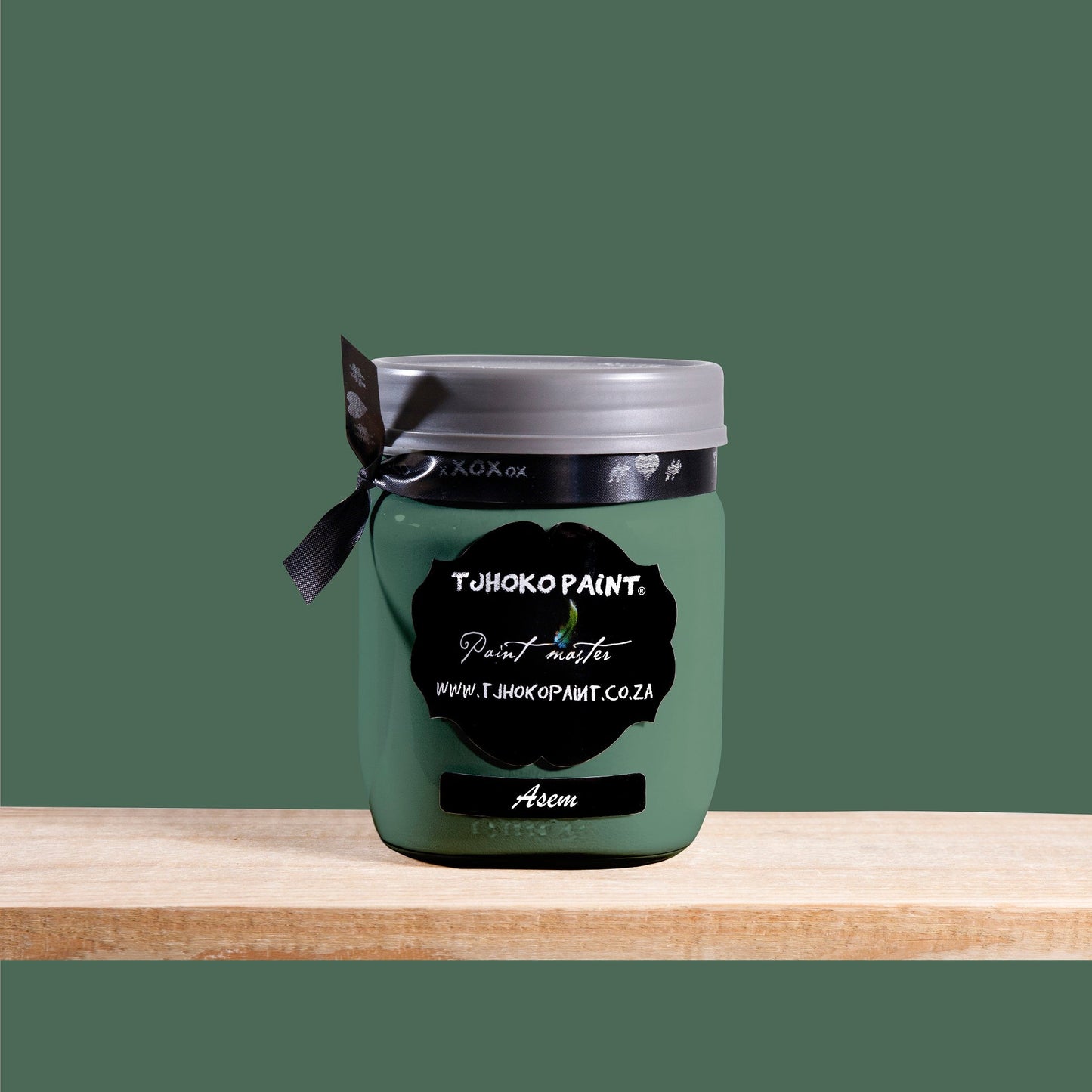Asem is a grounded, earthy green with blue undertones