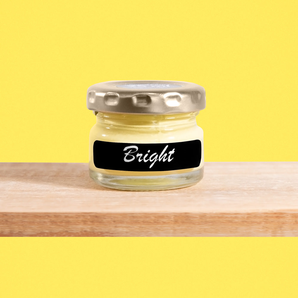 Bright is a vibrant shade of yellow reminiscent of sunshine on a clear day.