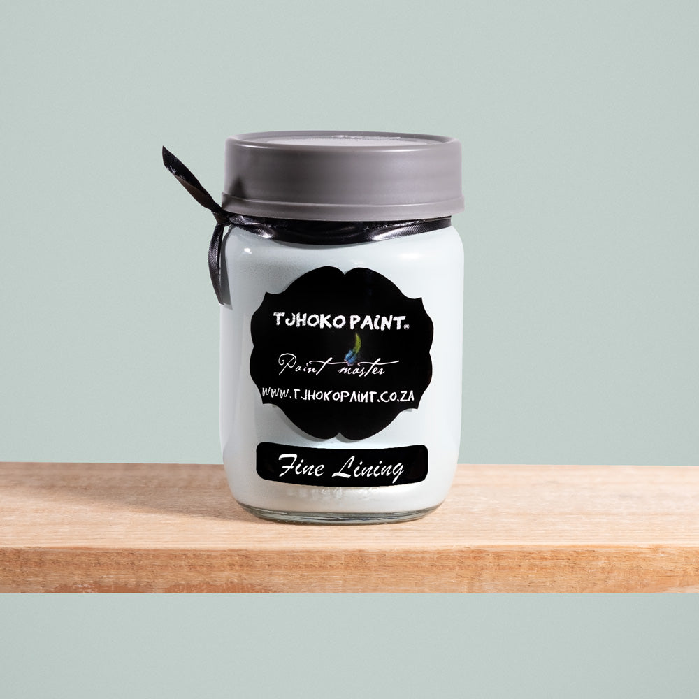 Fine Lining is a delicate shade of pale green-blue, reminiscent of wispy clouds against a clear sky.