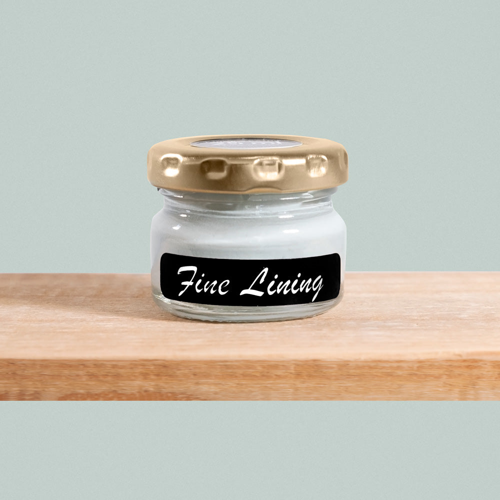 Fine Lining is a delicate shade of pale green-blue, reminiscent of wispy clouds against a clear sky.