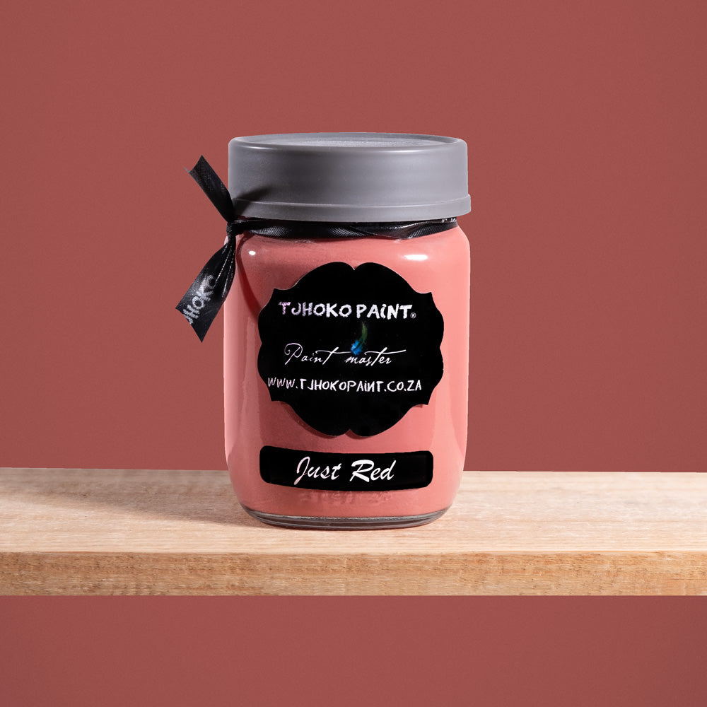 Just Red is a muted, shade of a brown--red with a tinge of muted pink.