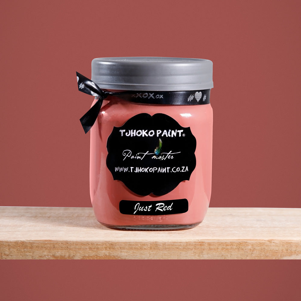 Just Red is a muted, shade of a brown--red with a tinge of muted pink.