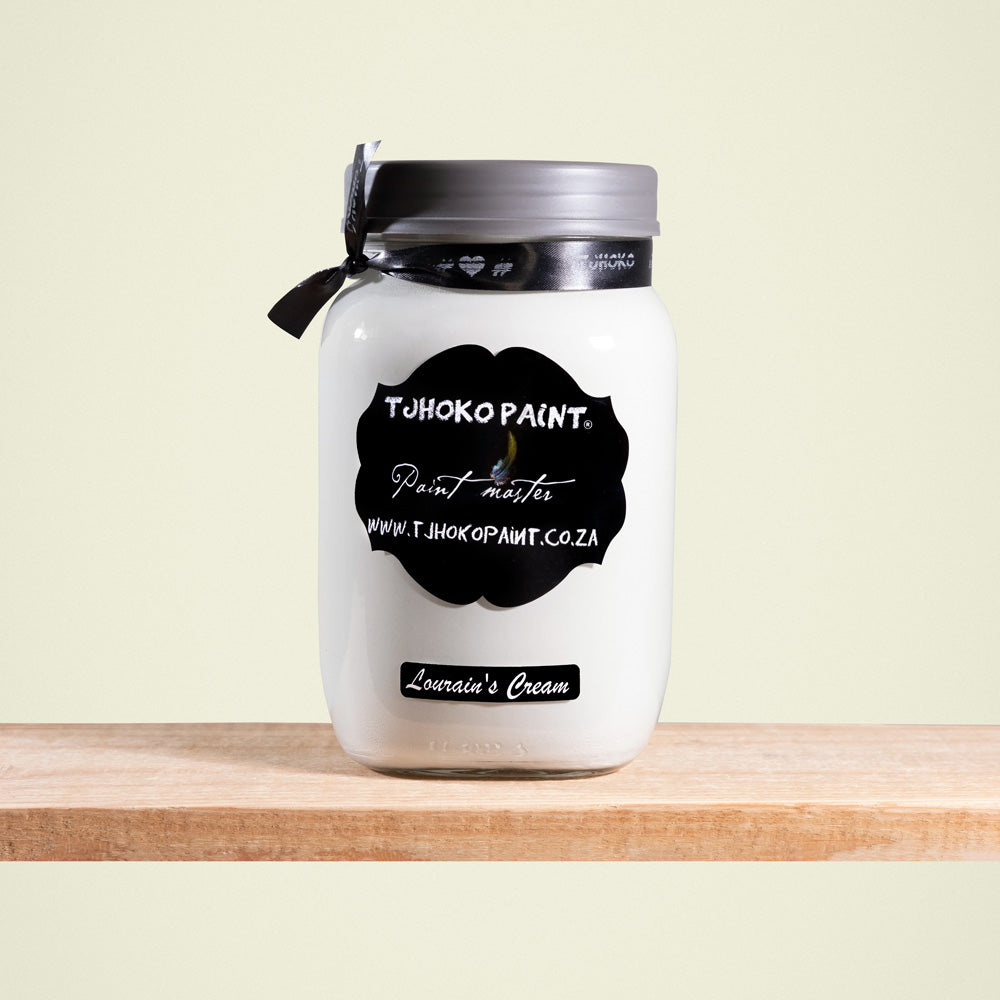 Lourain’s Cream corresponds to a light, muted shade of yellow-beige.