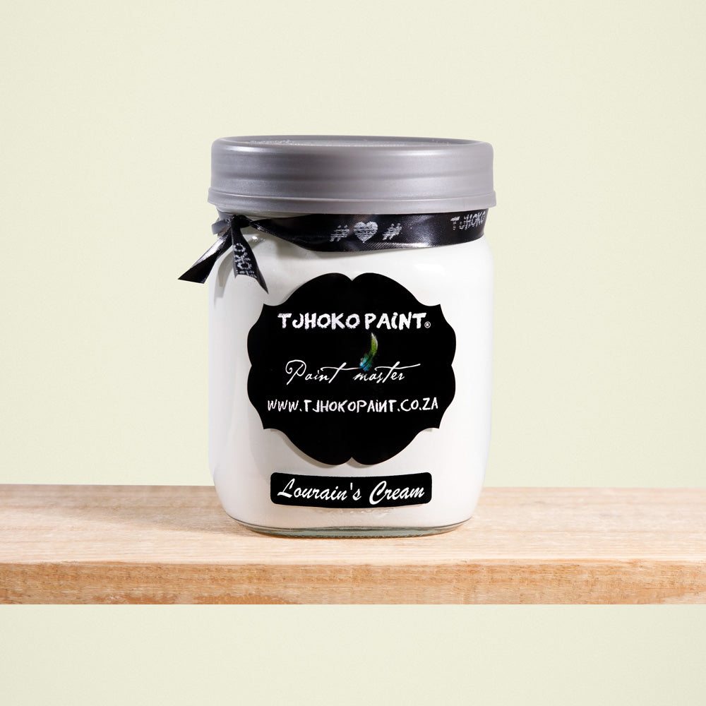 Lourain’s Cream corresponds to a light, muted shade of yellow-beige.