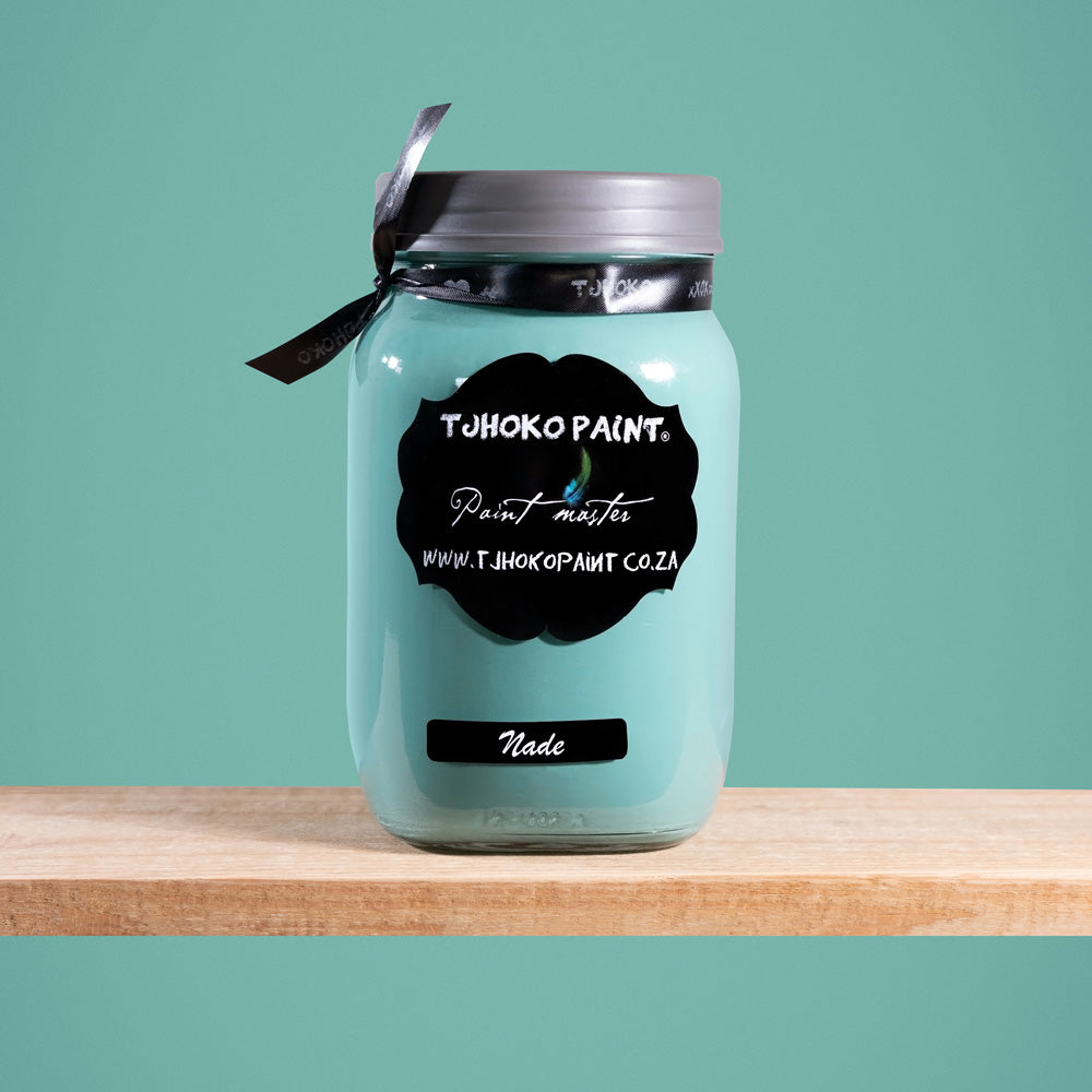 Nade is a soothing shade of aqua green, reminiscent of calm ocean waters.