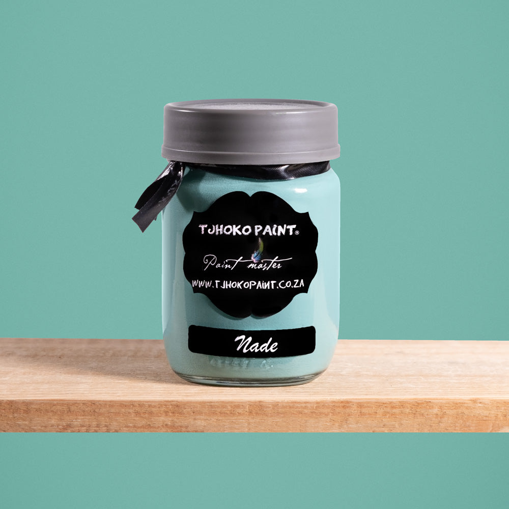 Nade is a soothing shade of aqua green, reminiscent of calm ocean waters.