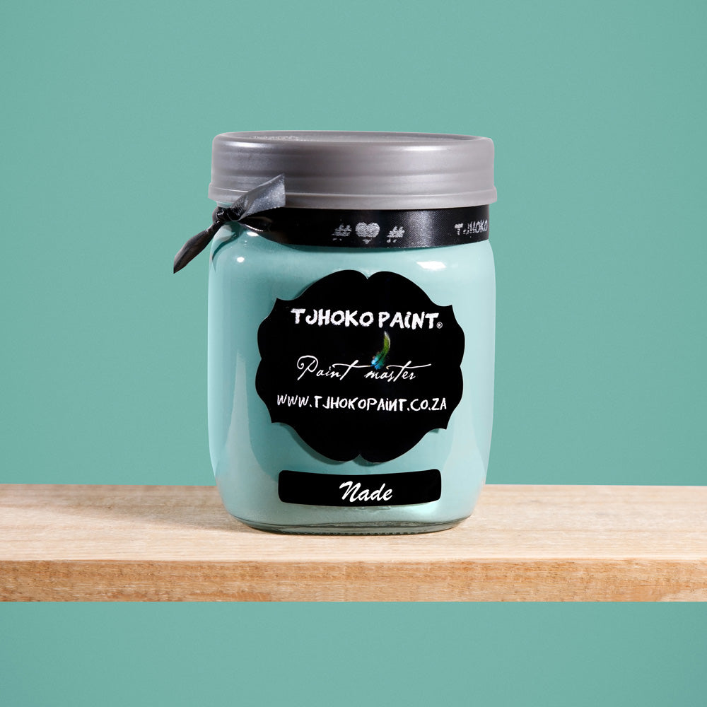 Nade is a soothing shade of aqua green, reminiscent of calm ocean waters.