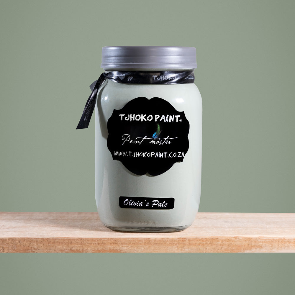 Olivia's Pale is a soft, muted shade of green-gray olive tones reminiscent of misty mornings in the countryside.