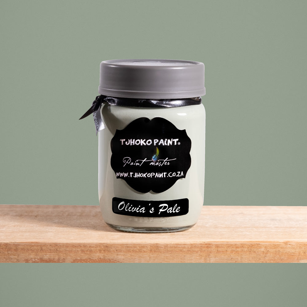 Olivia's Pale is a soft, muted shade of green-gray olive tones reminiscent of misty mornings in the countryside.