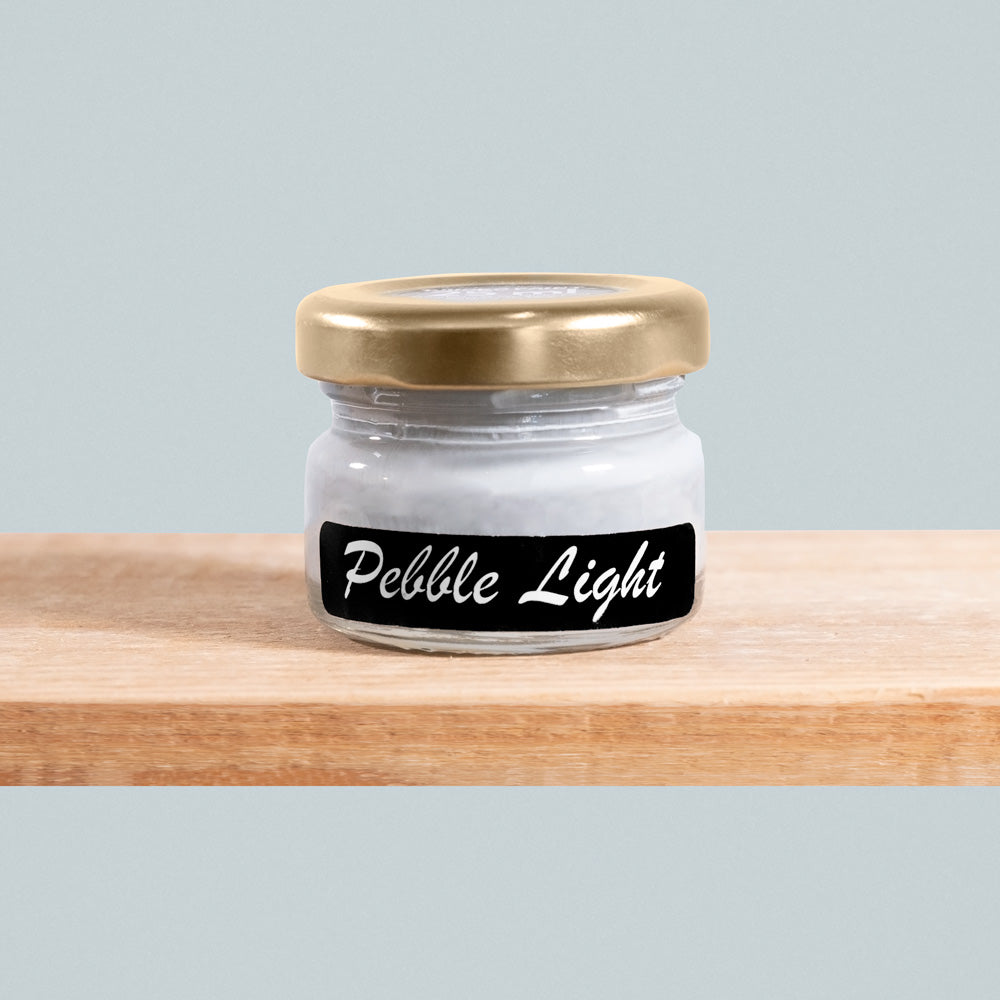 Pebble Light is a gentle, airy hue resembling the soft tones of beach pebbles.