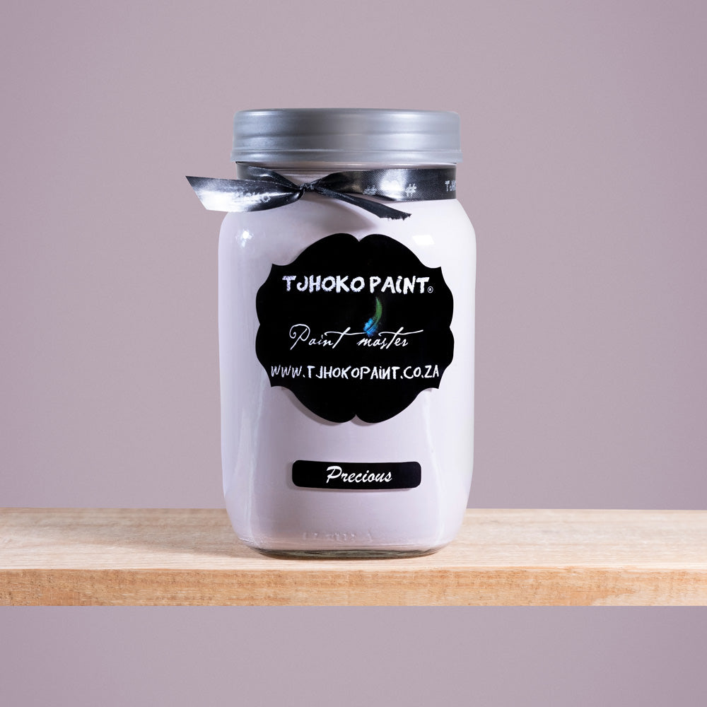 Precious is a soft, muted shade of pinkish-purple-gray reminiscent of delicate pearls.