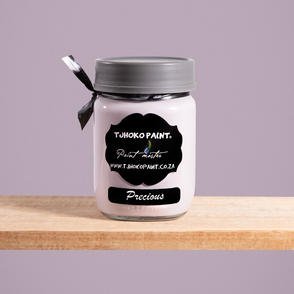 Precious is a soft, muted shade of pinkish-purple-gray reminiscent of delicate pearls.