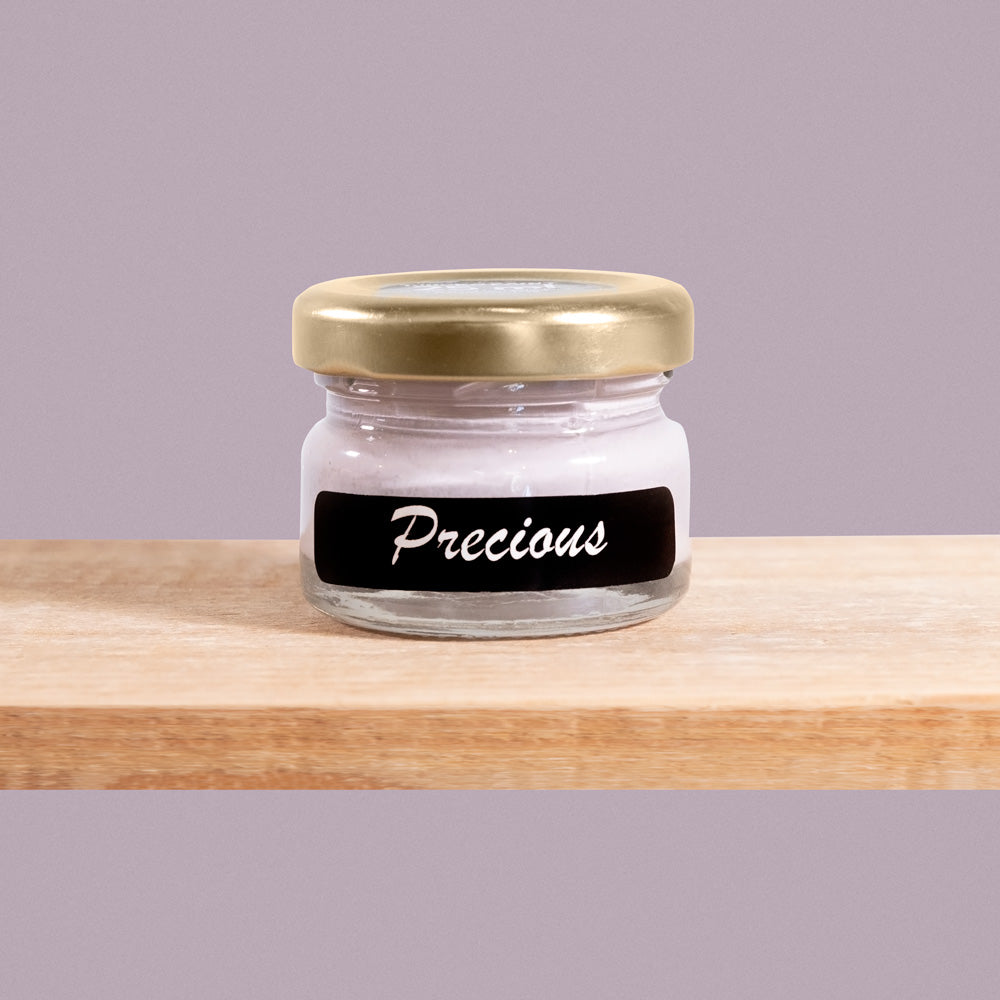 Precious is a soft, muted shade of pinkish-purple-gray reminiscent of delicate pearls.