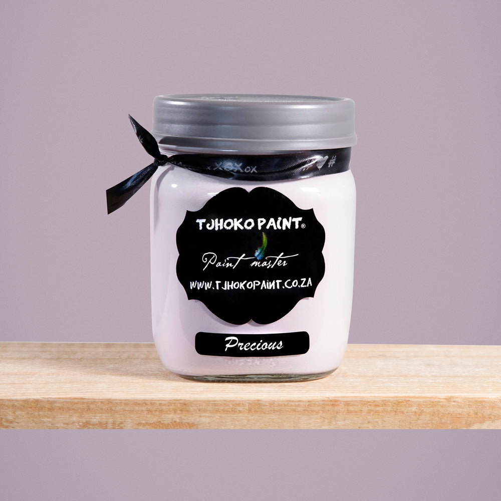 Precious is a soft, muted shade of pinkish-purple-gray reminiscent of delicate pearls.