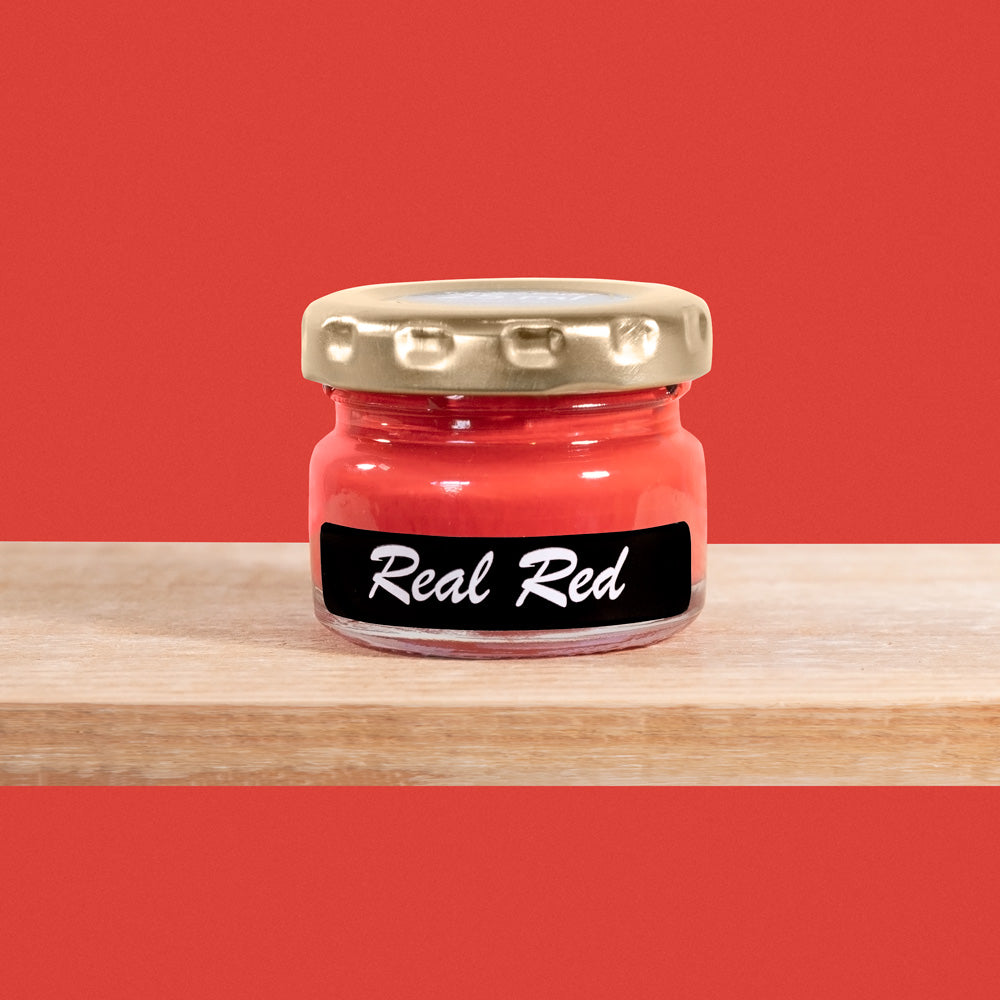 Real Red is a classic, vibrant shade of red reminiscent of a combination crimson and vermillion-orange tones.