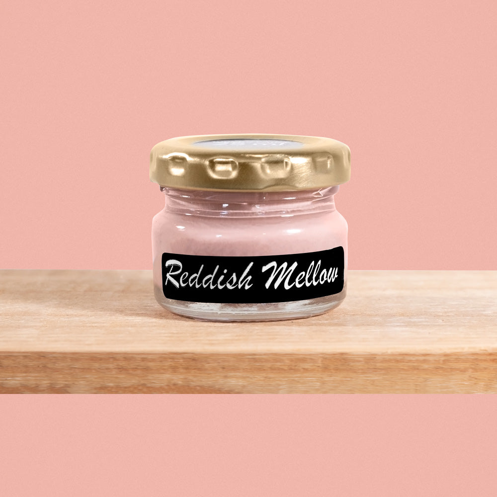 Reddish Mellow is a soft, muted shade of coral with hints of warmth.