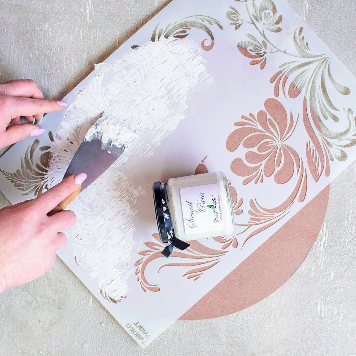Tjhoko Paint's Stencil of Paris paste is an easy-to-use embossing paste or a texture and dimension additive for furniture makeovers, canvas and artwork or walls.