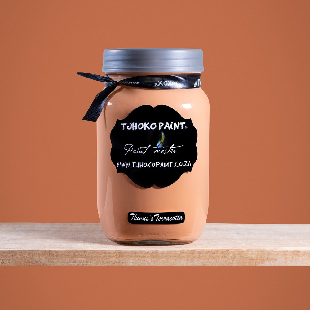 Thinus's Terracotta is a rich, earthy shade of orange reminiscent of sun-baked clay.