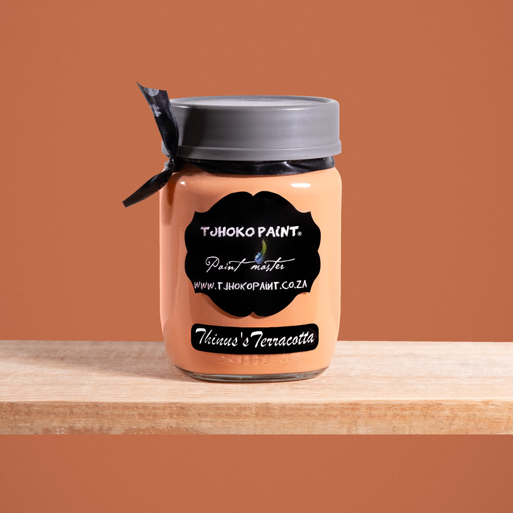 Thinus's Terracotta is a rich, earthy shade of orange reminiscent of sun-baked clay.
