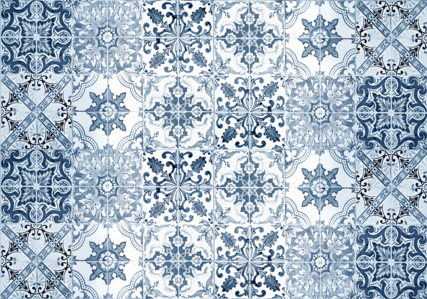 An intricate pattern of vintage-inspired tiles in timeless blue and white tones