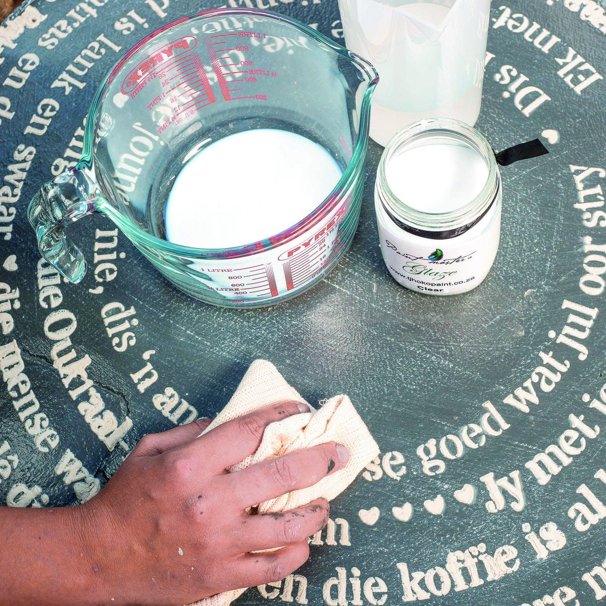 Tjhoko Paint Clear Glaze is a 100% Acrylic water based sealer that can be used to give your Tjhoko painted surface an extra layer of protection and a subtle sheen.