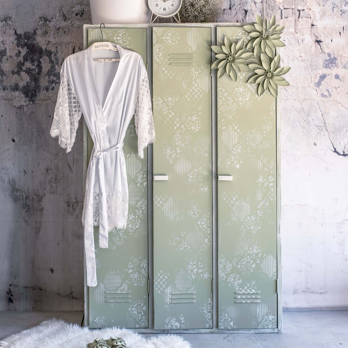 Olivia's Pale is a soft, muted shade of green-gray olive tones reminiscent of misty mornings in the countryside.