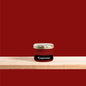 A deep red shade that radiates warmth and timeless elegance