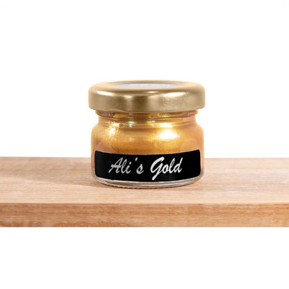 Ali's Gold by Tjhoko Paint is a rich, shimmering gold, eco-friendly, and water based metallic paint.