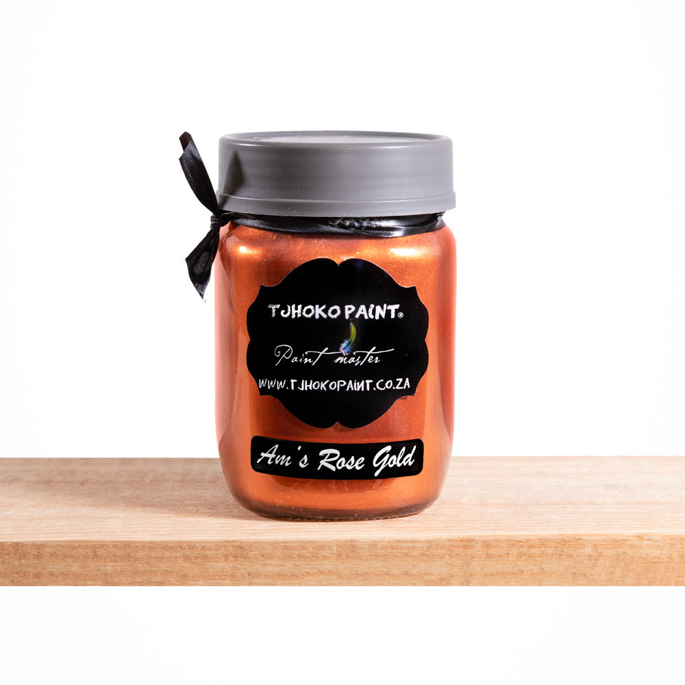 "Am's Rose Gold" by Tjhoko Paint is a striking, water-based, non-toxic metallic paint with a rich coppery-pink hue. 