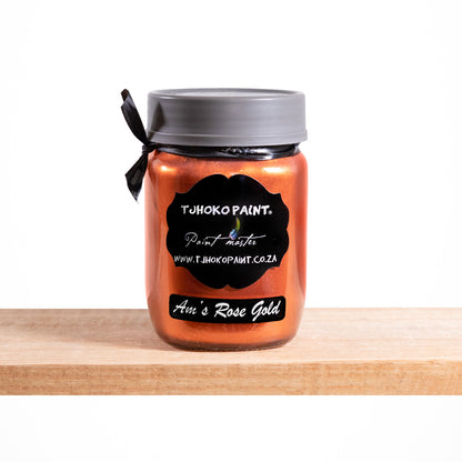 "Am's Rose Gold" by Tjhoko Paint is a striking, water-based, non-toxic metallic paint with a rich coppery-pink hue. 
