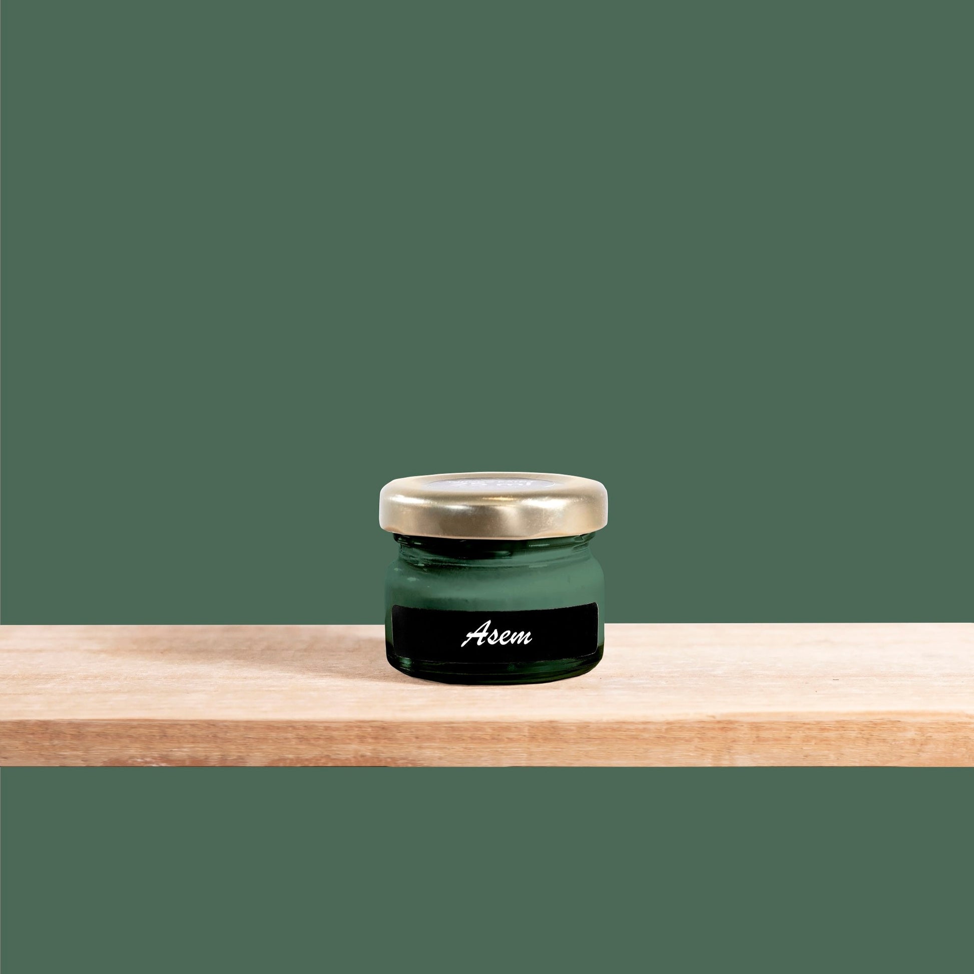 Asem is a grounded, earthy green with blue undertones