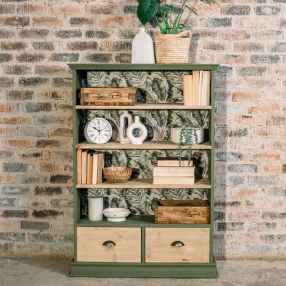 Creative Chrystal is a dark yet muted shade of olive green, reminiscent of sun-dappled leaves.