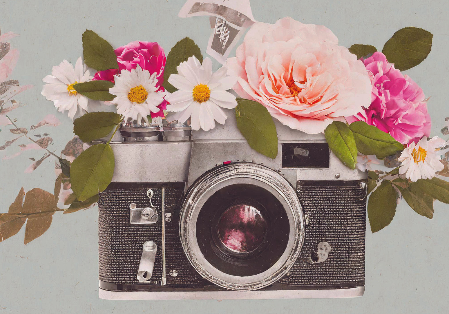 Capture the nostalgia of yesteryears with this feature of classic camera peeking through a bouquet of vivid blooms