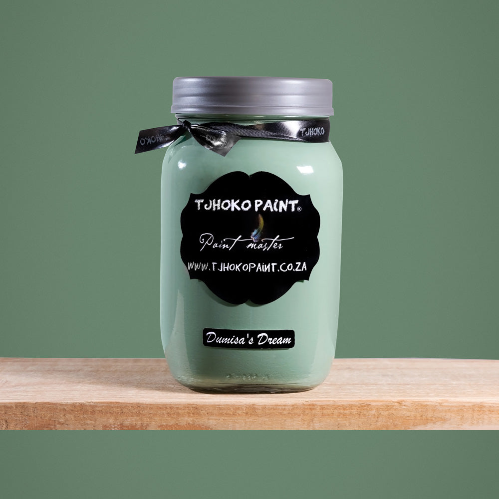 Dumisa's Dream is a serene shade of muted sage green, reminiscent of tranquil forest landscapes.